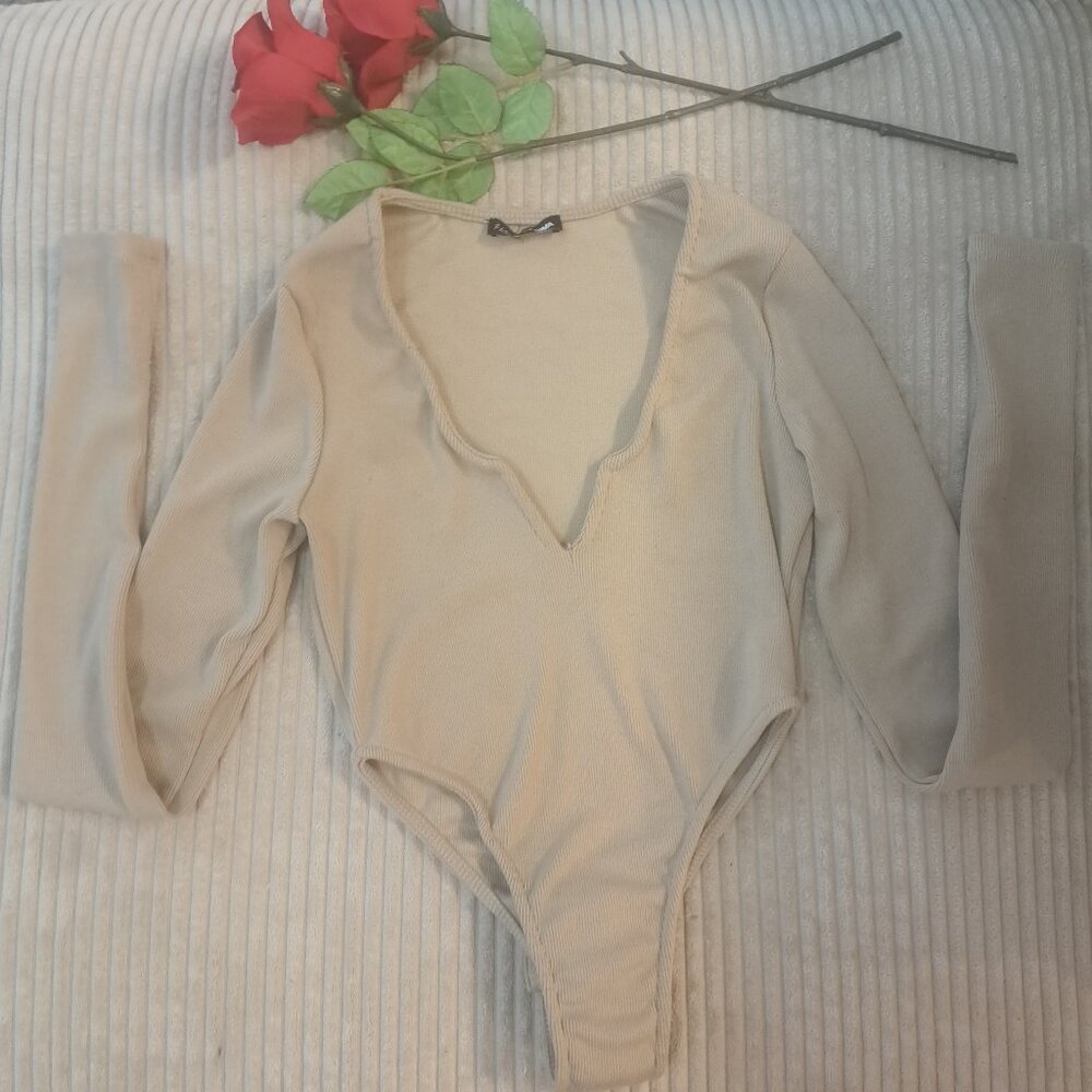 Women's long sleeved body suit